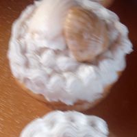 Shell Cupcakes Vanilla cupcakes with shell & star toppings made from fondant.