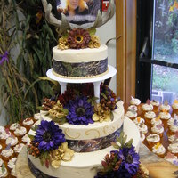 Camo Wedding A great friend wanted a very unique cake. her colors were camo and fall colors. she was very happy with how it turned out and so was I...
