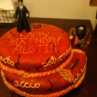 Harry Potter Cake 10 and 12 inch rounds, all MMF (except for writing). Figurines were given by the person who cake was for