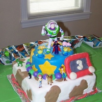 Toy Story Birthday Cake Buttercream Icing and Fondant, Etchisketch is made with cereal treats and fondant