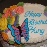 Wilton Course 2 Final Cake Basket weave cake with all of the flowers that I learned to make over the four week period. These were done in royal icing. Each took a lot...