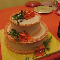 My Mother's 83Rd Birthday Cake dominican cake with pinapple filling. calla lilly flowers made out of gum paste.
