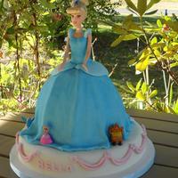 Cinderella Fun cake. Made for my brothers niece. MMF Fondant, brushed with blue Pearl Dust to capture the magic of the Cinderella story. Doll, bird,...