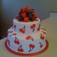 Cherries! This cake was for a book release party where cherries appeared multiple times in the book. The inspiration came from the print on a dress...