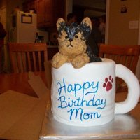 Pup In A Cup This was made to look like my mom's yorkie...and she loves coffee. The dog was made from RKT and covered in modelling chocolate. The...