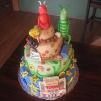 The Ant And The Grasshopper This is a cast party cake for a children's production of "The Ant and the Grasshopper". All of the cakes are covered in mmf...