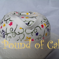 Purse Vines Carved cake with fondant. Wilton Impression mat painted with gel colors. Made for a "31 Purse Party"