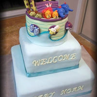 Noah's Ark Made the cake for a baby shower. All fondant and figures custom color tinted and modeled to match the invitation given to me by the client...