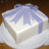 First Fondant Cake My first fondant-covered cake! Actually a fake cake. Can't believe how easy it was!