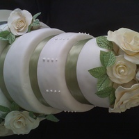 Ivory Roses This is the top view of the Ivory Roses cake. I tried to add it along with the other picture but it doesn't seem to be working.