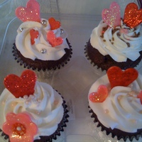 Valentine's Day Cupcakes These are cupcakes I made to sell at our restaurant for Valentine's day. Chocolate cake with Vanilla buttercream.