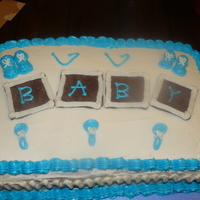 Baby Shower Half white/half chocolate sheet cake. All vanilla buttercream. I'm just starting with pipping. Customer saw a cake like this. I did...
