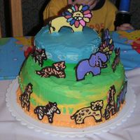 Animal Birthday Cake my son's first birthday cake. animals are made from candy melts.