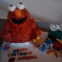Elmo Cake First 3D cake. All buttercream,fondant cut outs and white cake. For my 2 year old who loves Elmo.