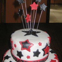 Graduation Cake vanilla cake with oreo cream filling. school colors are red and black. cake also included a black and white picture of the grad. as a...