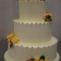 Fondant With Gumpaste Flowers Fondant covered cake with fondant pearls. Flowers are gumpaste. Thanks for looking! Minette