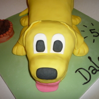 Dog The dog bowl has brownie cut into small squares to resemble meat.