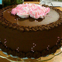 Chocolate Peanutbutter Cake Chocolate peanutbutter cake with ganache and buttercream roses.