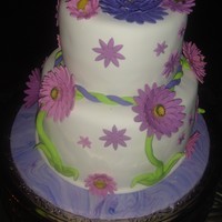 Gerbera Daisy Graduation Cake H.S. Graduation Cake for friend's twin daughters. One wanted purple gerbera daisy theme and other wanted traditional grad cake (...