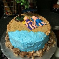 Couple On The Beach this was for a couple's bridal shower. the couple was getting married on the beach in Mexico so they wanted a beach themed cake. the...