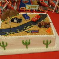 Disney Cars Cake I did this cake for my son's 2nd birthday party. It is 11 x 15, devil's food with chocolate barvarian cream in the middle. It is...