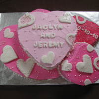 Hearts Bridal Shower Cake Various flavors of cake, funfetti, yellow, and chocolate. Buttercream frosting and fondant accents.