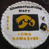 Iowa Hawkeyes Graduation Cake Yellow cake, chocolate ganache filling with buttercream frosting. This cake was for a high school graduation that is attending Iowa in the...