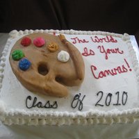 The World Is Your Canvas Graduation Cake! This was for a high school graduate attending college with an art scholarship. Chocolate cake with buttercream frosting and fondant accents...