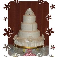 Katia's Seet 15Th Covered in fondant, crown made in fonfant and gum tex mix then dusted with pearl dust. Daisies also made in fondant/gum tex mix. Pleaded...