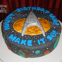 St:tng Communicator Cake Chocolate cake with peanut butter buttercream frosting and fondant. Communication logo is fondant with gold/silver paint. Marbled fondant...