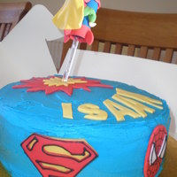 Superhero Birthday Cake Superhero themed birthday cake.Buttercream with fondant models and logos.