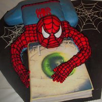 Spiderman Crawling Over A Book James Robert Jr published his first book "toss".. He loves spiderman and so I combined the two !