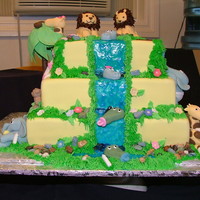 Baby Animal Baby Shower Cake A friend requesting a baby shower cake with baby animals on it and this is what I came up with. Cake is covered in vanilla fondant, animals...