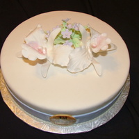 Orchids This is my first attempt at gumpaste flowers and so far I'm not a fan BUT I think the turned out okie dokie.