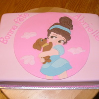 Cinderella's A Brunette Chocolate cake filled with chocolate buttercream. Decorating is done in fondant and name is piped with buttercream.This mother wanted this...