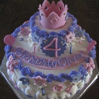 2 Teir Princess Cake This cake is covered with buttercream icing and all the accents are made with fondant. Thank you for looking