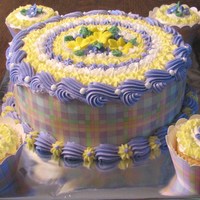 Cake And Cupcakes To Match I printed the plaid image from my special printer that uses edible ink cartridges (food coloring) onto a frosting sheet and then wrapped it...