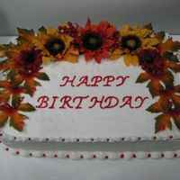 Fall Birthday Cake This cake was my first attempt at using silk flowers! Wow! A lot less stressful!!! Iced in BC.