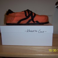 Sneaker Cake The story behind this cake is that my boyfriend has a pair of sneakers that WERE bright orange and are about 7 years old. I have been...