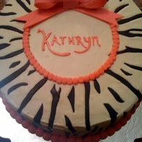 Zebra! Frosted with Buttercream with fondant zebra stripes. The bow is gumpaste. This cake was 100% inspired by another CakeCentral lover. Thank...
