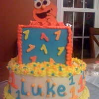 Elmo First Birthday Smash Cake The topper is all gum paste. Everything else is buttercream.