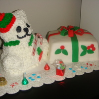 Xmas Gifts bear is butter pecan cake and gift box is lemon cake both covered in fondant made this for a co-worker.