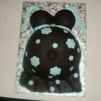 Pregnant Belly Cake made this for my step daughter, marble cake covered in fondant