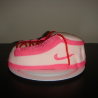Nike Sneaker yellow cake used grand daughters shoe as pattern/template and tried my hand at scuplting got this idea from this site (anamado made a cake...