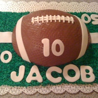 Football Cake Birthday cake shaped like a egg...I mean football. :)