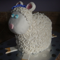 Baptism Cake This was for my niece's baptism it is covered in fondant with buttercream swirls for the fluffy wool.