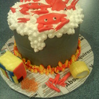 Crab Pot Pot is half vanilla cake, half checkerboard with BC icing. Crabs are RKT covered in fondant.