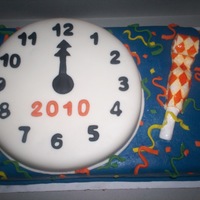 New Years Eve Cake MMF with all 50/50 MMF/GP decorations. I found a picture of a real blower online to look at in order to make the mmf/gp blower.