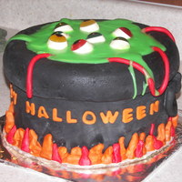 Witch's Brew This is a witch's brew cake that I made for a halloween party this year. I used fondant mostly and the green is dyed white chocolate...