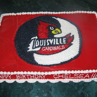 University Of Lousville Cake 12x18 cake - half chocolate half white with buttercream icing- free handed design work from an idea off the internet